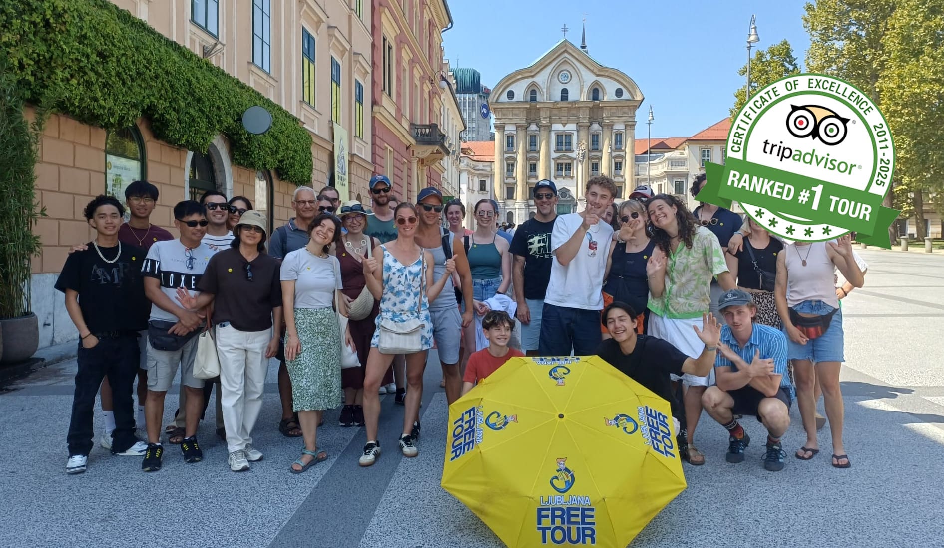 Ljubljana Free Tour group with a yellow umbrella in the Old Town