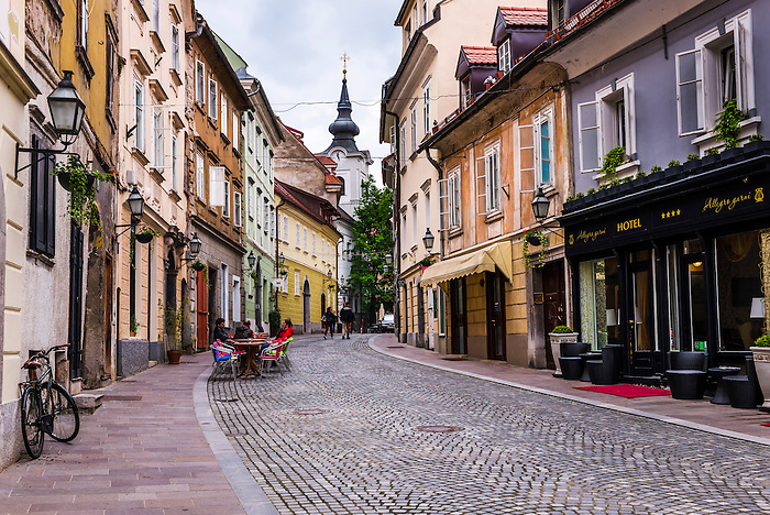 Cobbled street and cafés in Ljubljana Old Town