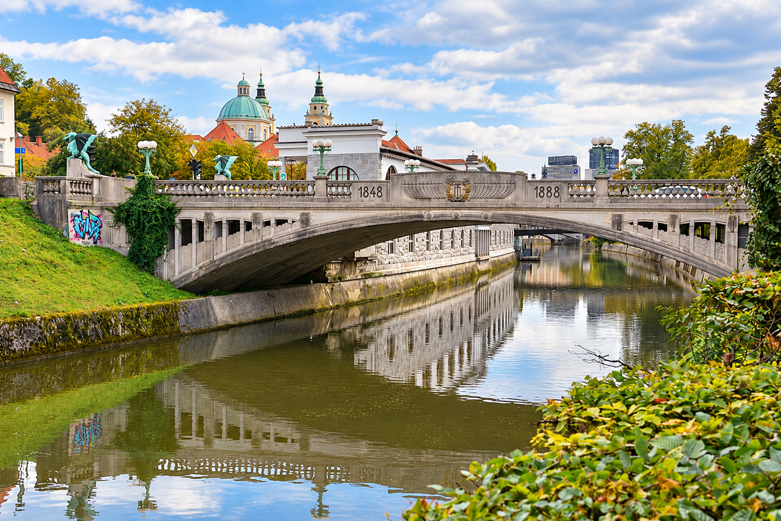 Dragon Bridge and its dragon statues viewed across the river