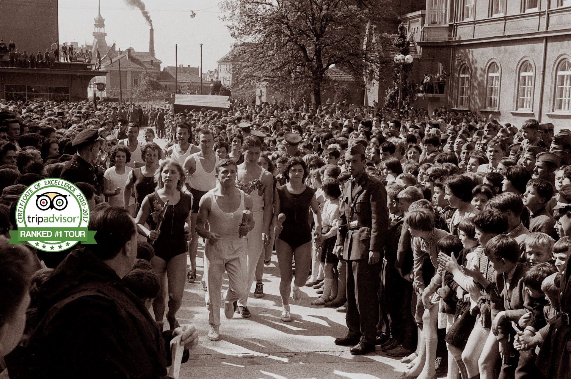 Historic crowd in Ljubljana on the Communist Tour banner